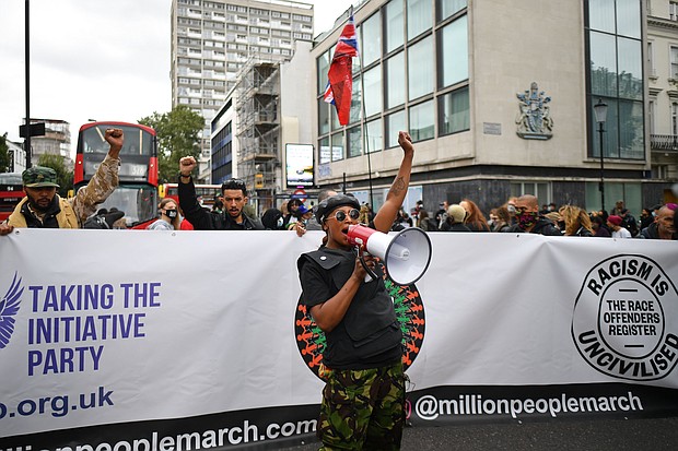 Sasha Johnson pictured in August 2020 at a march against institutional racism in London.
Mandatory Credit:	JUSTIN TALLIS/AFP/AFP via Getty Images
