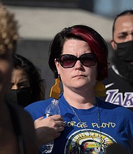 Courteney Ross, girlfriend of George Floyd, attends a rally and march organized by families who were victims of police brutality Monday, May 24, in St. Paul, Minnesota.
Mandatory Credit:	Christian Monterrosa/AP