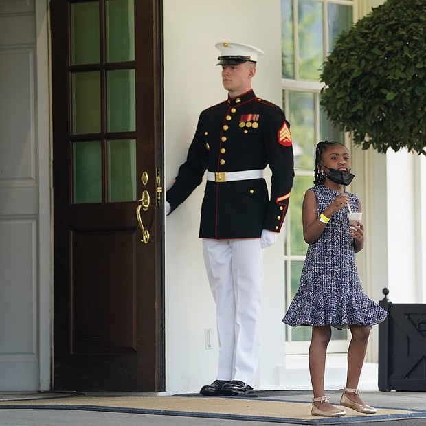 For her father / Gianna Floyd, the 7-year-old daughter of the late George Floyd, takes an ice cream break during the Floyd family’s meeting at the White House with President Biden and Vice President Harris on Tuesday, the first anniversary of her father’s death at the hands of Minneapolis police. According to reports, the youngster told the president she was hungry and asked if he had any snacks. He responded by providing ice cream, Cheetos and chocolate milk. While the meeting may have proved a little much for the youngster, family members left optimistic about prospects for Senate passage of a police reform package named for George Floyd.