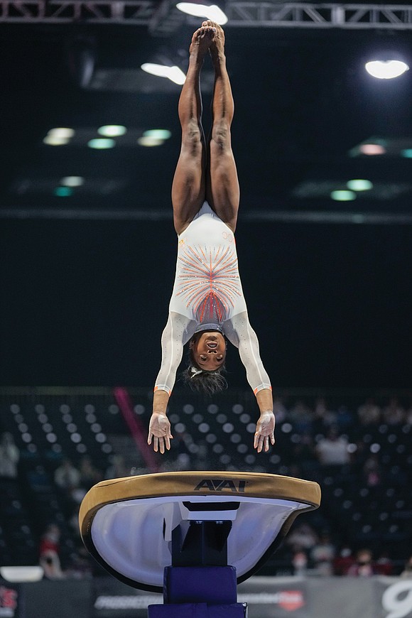 Time on her hands and a world-class gym at her disposal after the 2020 Olympics were postponed, Simone Biles started ...