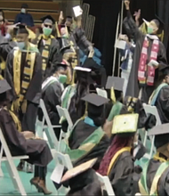 Wilberforce University graduates scream, shout and jump for joy as President Elfred Anthony Pinkard announces during last Saturday’s commencement that their debts to the school have been forgiven. The ceremony was streamed on the university’s YouTube channel.