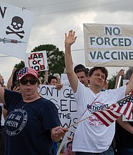 Protesters outside Houston Methodist Baytown Hospital in Baytown, Texas, on Monday, June 7. A small group of employees and supporters were protesting the hospital's policy of requiring employees to be vaccinated against Covid-19.
Mandatory Credit:	Yi-Chin Lee/Houston Chronicle/A