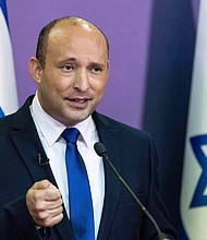 Naftali Bennett, pictured here in Jerusalem, on May 30 is a former tech entrepreneur who entered politics to serve then-opposition leader Benjamin Netanyahu as chief of staff, but ousted Netanyahu, bringing an end to his run as the country's prime minister.
Mandatory Credit:	YONATAN SINDEL/POOL/AFP/Getty Images