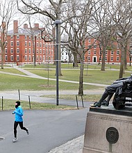 The Supreme Court postpones action on a major challenge to Harvard's use of racial affirmative action, a case that could end practices that have boosted the admission of Black and Latino students for decades. Pictured, a runner on March 23, 2020 in Massachusetts.
Mandatory Credit:	Maddie Meyer/Getty Images/FILE