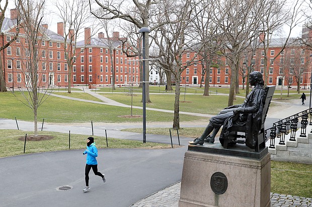The Supreme Court postpones action on a major challenge to Harvard's use of racial affirmative action, a case that could end practices that have boosted the admission of Black and Latino students for decades. Pictured, a runner on March 23, 2020 in Massachusetts.
Mandatory Credit:	Maddie Meyer/Getty Images/FILE