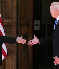 Russian President Vladimir Putin and U.S President Joe Biden shake hands during their meeting at the 'Villa la Grange' in Geneva, Switzerland on June 16. Biden and Putin issued a joint statement following their historic summit.
Mandatory Credit:	Alexander Zemlianichenko/AP