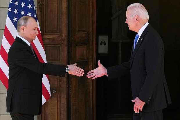 Russian President Vladimir Putin and U.S President Joe Biden shake hands during their meeting at the 'Villa la Grange' in Geneva, Switzerland on June 16. Biden and Putin issued a joint statement following their historic summit.
Mandatory Credit:	Alexander Zemlianichenko/AP