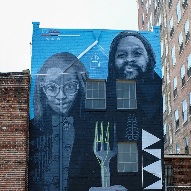 Cityscape: Slices of life and scenes in Richmond/The mural “African American Gothic” is a modern take on Grant Woods’ classic 1930 painting titled “American Gothic” that depicts an elderly farming couple with the man holding a pitchfork. This version, created by artists Andre Shank and Sone-Seeré, can be found on a building at 404 E. Grace St. in Downtown.