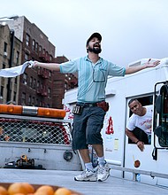 Lin-Manuel, left, and Chris Jackson in a scene from “In the Heights.”