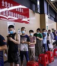 Residents line up at a vaccination site on June 9 in the city of Wuhan, China.
Mandatory Credit:	Getty Images