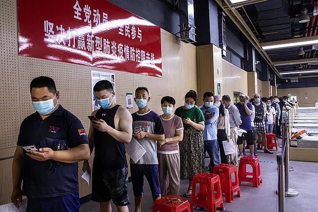 Residents line up at a vaccination site on June 9 in the city of Wuhan, China.
Mandatory Credit:	Getty Images