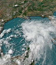 The storm, which is expected to strengthen into a Tropical Cyclone 3, is forecast to hit Alabama, Mississippi, Georgia, Louisiana and the Florida Panhandle starting Friday night.
Mandatory Credit:	CNN