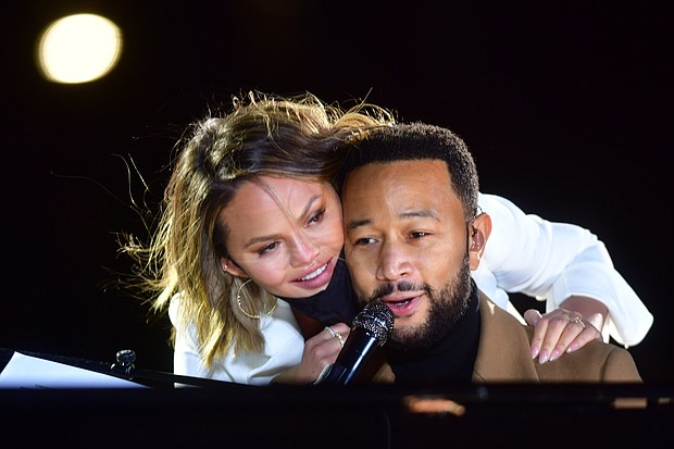 Singer John Legend said that his wife Chrissy Teigan is doing "great."
Mandatory Credit:	Mark Makela/Getty Images