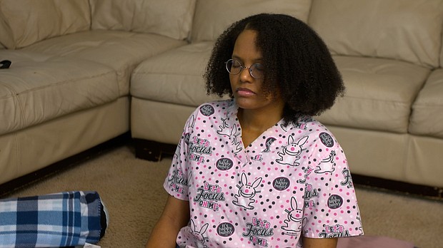 Lakiea Bailey meditates during an online yoga class designed for sickle cell survivors.
Mandatory Credit:	Steve Sorg/ CNN