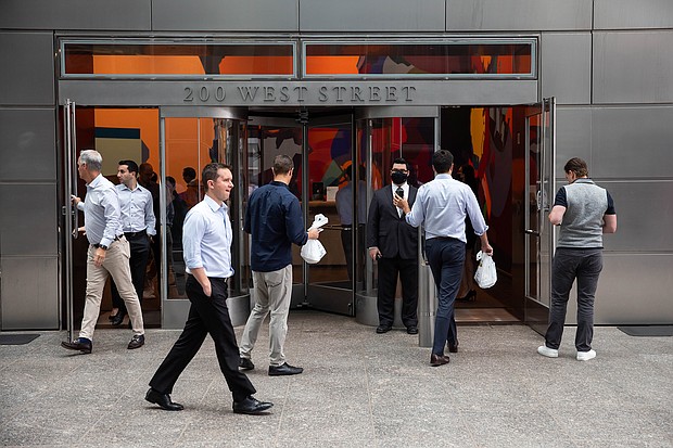People enter the Goldman Sachs headquarters building in New York on Monday, June 14.
Mandatory Credit:	Michael Nagle/Bloomberg/Getty Images