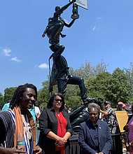 Kwame Akoto-Bamfo, an artist from Ghana, unveiled his work, Blank Slate Monument, at Saturday’s Juneteenth event at the DuSable Museum of African American History. Photo by Tia C. Jones