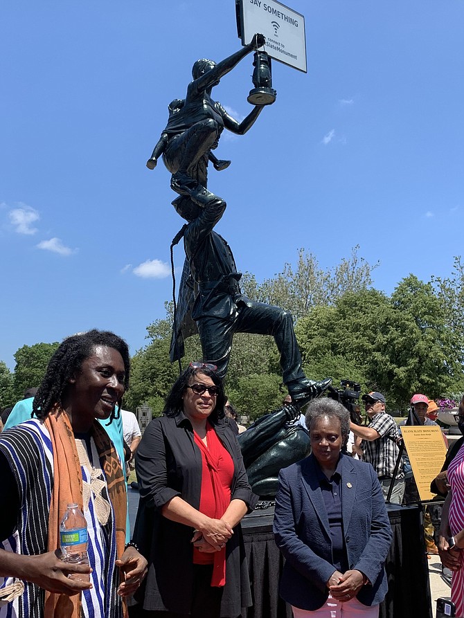 Kwame Akoto-Bamfo, an artist from Ghana, unveiled his work, Blank Slate Monument, at Saturday’s Juneteenth event at the DuSable Museum of African American History. Photo by Tia C. Jones