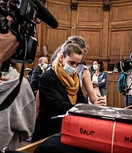Valerie Bacot (center) admitted to shooting her husband Daniel Polette dead in self-defense in 2016. She faces a life sentence for murder.​
Mandatory Credit:	JEFF PACHOUD/AFP/Getty Images