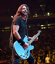 Dave Grohl performs onstage as The Foo Fighters reopen Madison Square Garden on Sunday.
Mandatory Credit:	Kevin Mazur/Getty Images