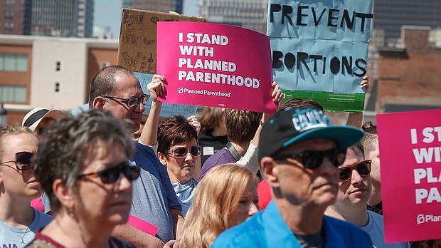 Supporters of Planned Parenthood gathered for a rally on Friday, May 4, 2018, at the Iowa Capitol grounds in Des Moines. An Iowa law requiring women to wait 24 hours before getting an abortion was permanently blocked by a district judge on June 21.
Mandatory Credit:	Byron Houlgrave/The Register/USA Today Network