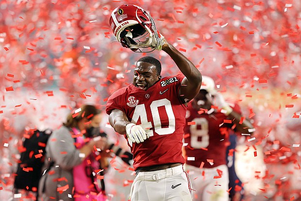 Caption:	Joshua McMillon of Alabama celebrates his team's victory in the College Football Playoff National Championship in January.
Mandatory Credit:	Kevin C. Cox/Getty Images