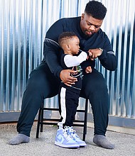 Demez White with his son Lennox White
