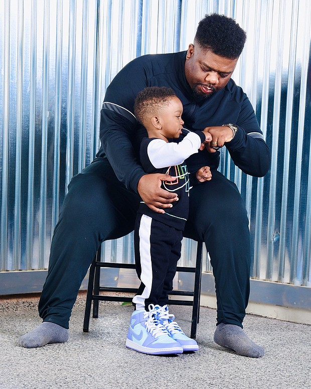 Demez White with his son Lennox White