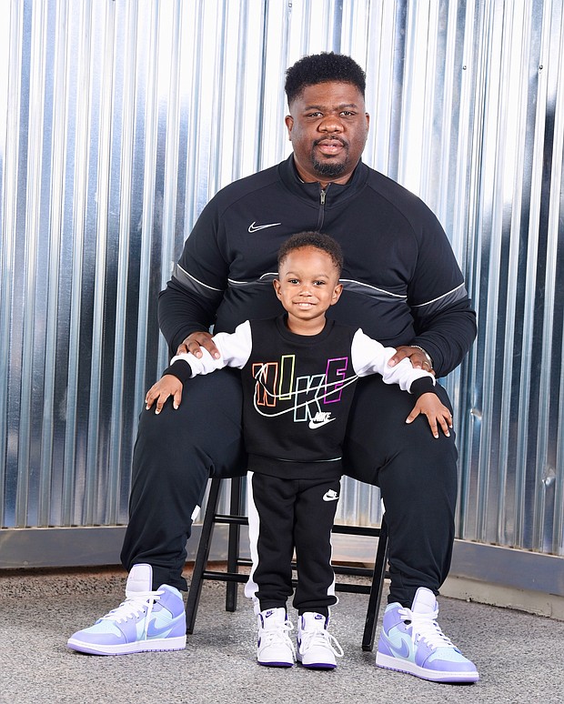 Demez White with his son Lennox White