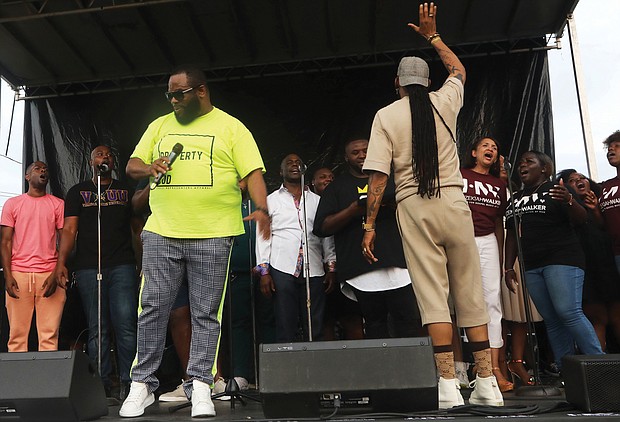 More than 1,000 people relaxed on the lawn of Virginia Union University, enjoying the sounds of local gospel groups at “Juneteenth: Sounds of Freedom Celebration” on Saturday evening. Highlights included performances by the Grammy Award-winning Hezekiah Walker, above, and the VUU Choir, led by David Bratton.