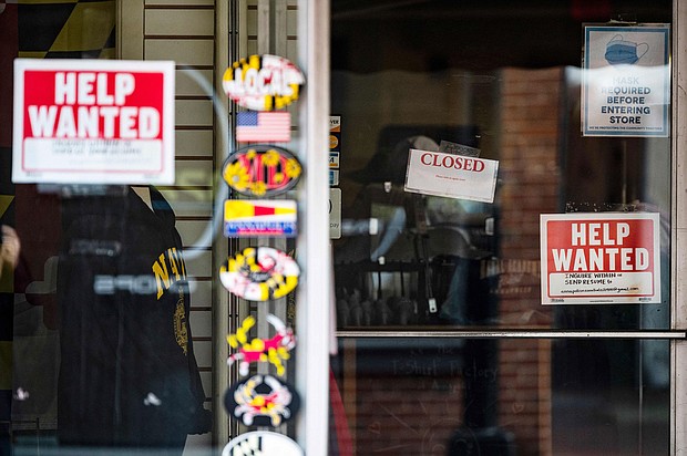 A store advertises a Help Wanted sign in Annapolis, Maryland, on May 12.
Mandatory Credit:	Jim Watson/AFP/Getty Images