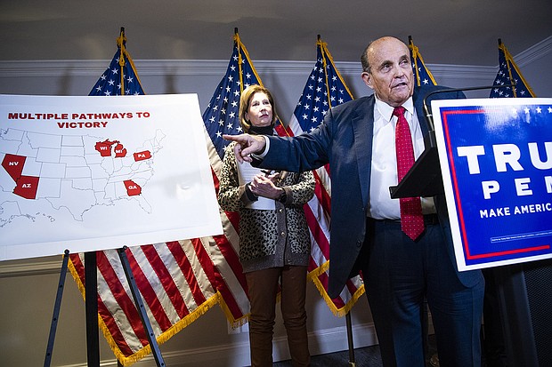 Rudolph Giuliani, attorney for President Donald Trump, conducts a news conference at the Republican National Committee on lawsuits regarding the outcome of the 2020 presidential election on November 19, 2020.
Mandatory Credit:	Tom Williams/CQ-Roll Call/Getty Images