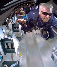 Richard Branson and crew aboard the VSS Unity on July 11.
Mandatory Credit:	Virgin Galactic