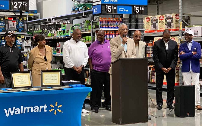 Congressman Bobby Rush during the reopening of Walmart. Rush spoke about the impact the Walmart, located at 10900 S. Doty Ave., has on the community. Photo By Tia Carol Jones