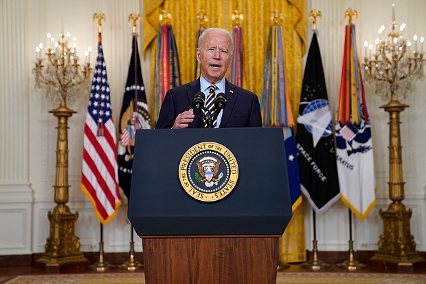 President Joe Biden speaks about the American troop withdrawal from Afghanistan, in the East Room of the White House on July 8 in Washington. Biden's review of former President Donald Trump's restrictive Cuba policy is still underway.
Mandatory Credit:	Evan Vucci/AP