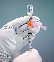 Federal health officials are investigating the possibility that Johnson & Johnson's coronavirus vaccine might slightly raise the risk of a rare neurological complication known as Guillain-Barré syndrome, a spokesperson from the US Centers for Disease Control and Prevention said in a statement to CNN on July 12.
Mandatory Credit:	Matt Rourke/AP