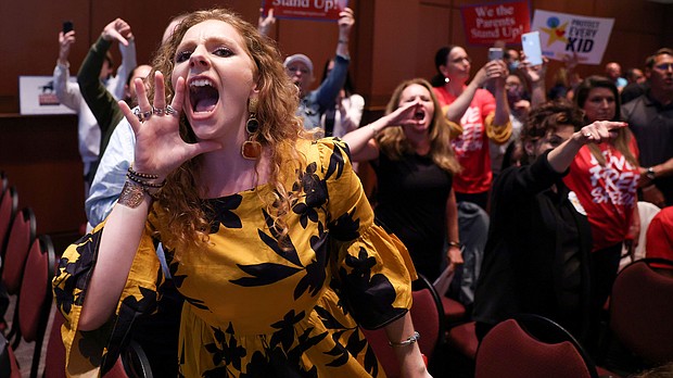 Loudoun County Public Schools in Virginia came under fire after chaos erupted at a June 22 school board meeting over claims that critical race theory was being taught in the classroom.
Mandatory Credit:	Evelyn Hockstein/Reuters