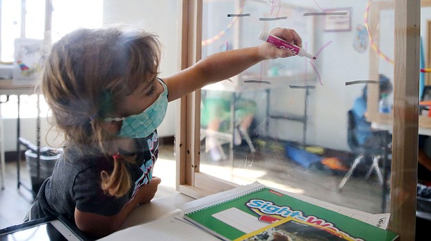 The American Academy of Pediatrics released new Covid-19 guidance for schools that supports in-person learning and, among other things, recommends universal masking in school of everyone over the age of 2.
Mandatory Credit:	Mario Tama/Getty Images