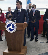 Secretary of Transportation Pete Buttigieg tours the 95th/Dan Ryan Red Line CTA station with Mayor Lori Lightfoot, CTA President Dorval Carter, Sens. Dick Durbin and Tammy Duckworth, and Democratic members of Illinois’ congressional delegation to promote President Joe Biden’s infrastructure plan on July 16, 2021. Image | Photo WTTW News
