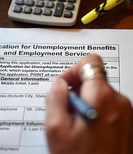Claims for US jobless benefits unexpectedly jumped last week offering the latest reminder that the American economy -- and the labor market -- are not yet back to normal.
Mandatory Credit:	OLIVIER DOULIERY/AFP/Getty Images