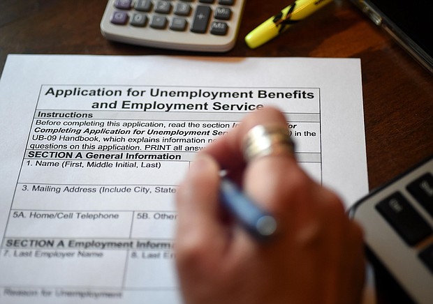 Claims for US jobless benefits unexpectedly jumped last week offering the latest reminder that the American economy -- and the labor market -- are not yet back to normal.
Mandatory Credit: OLIVIER DOULIERY/AFP/Getty Images