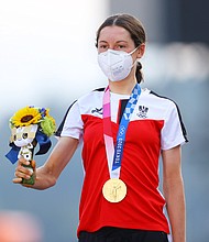 Anna Kiesenhofer of Team Austria poses with the gold medal after day two of the Tokyo 2020 Olympic Games at Fuji International Speedway on July 25 in Oyama, Shizuoka, Japan.
Mandatory Credit:	Tim de Waele/Getty Images