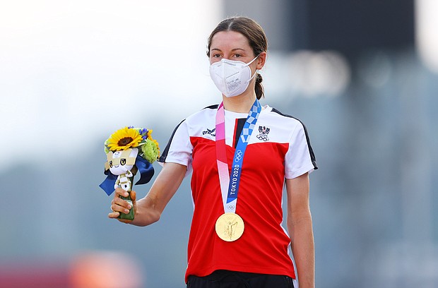 Anna Kiesenhofer of Team Austria poses with the gold medal after day two of the Tokyo 2020 Olympic Games at Fuji International Speedway on July 25 in Oyama, Shizuoka, Japan.
Mandatory Credit:	Tim de Waele/Getty Images
