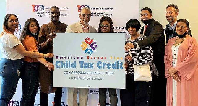 Congressman Bobby Rush joined families from Ada S. McKinley to discuss the benefits of the Child Tax Credit. Photo by Tia Carol Jones