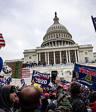 Pro-Trump supporters storm the U.S. Capitol following a rally with President Donald Trump on January 6. The Justice Department formally declined to assert executive privilege for potential testimony of at least some witnesses related to the January 6 Capitol attack.
Mandatory Credit: Samuel Corum/Getty Images