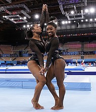 Simone Biles, of the United States, right, poses for pictures with teammate Jordan Chiles after an artistic gymnastics practice session at the 2020 Summer Olympics in Tokyo.
Mandatory Credit: Gregory Bull/AP