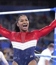 Jordan Chiles, of the United States, celebrates her performance on the uneven bars during the artistic gymnastics women's final at the 2020 Summer Olympics, Tuesday, July 27, in Tokyo.
Mandatory Credit: Gregory Bull/AP