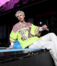 Machine Gun Kelly isn't a fan of his new movie, "Midnight in the Switchgrass."
Mandatory Credit: Ben Liebenberg/AP