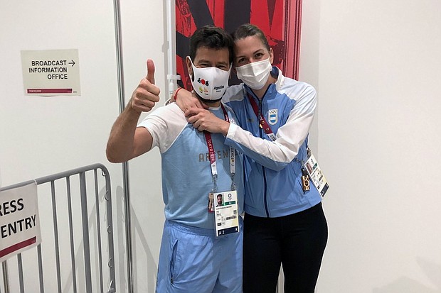Maria Belen Perez Maurice hugs her coach, Lucas Guillermo Saucedo, after he proposed to her on the sidelines of the Olympic fencing competition in Chiba, Japan on July 26.
Mandatory Credit:	Sakura Murakami/Reuters