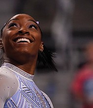 Simone Biles waits to compete on the balance beam during the U.S. Gymnastics Championships in early June in Fort Worth, Texas.
