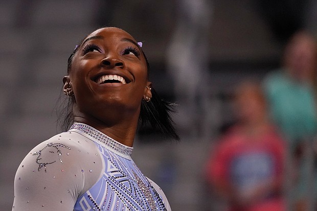 Simone Biles waits to compete on the balance beam during the U.S. Gymnastics Championships in early June in Fort Worth, Texas.